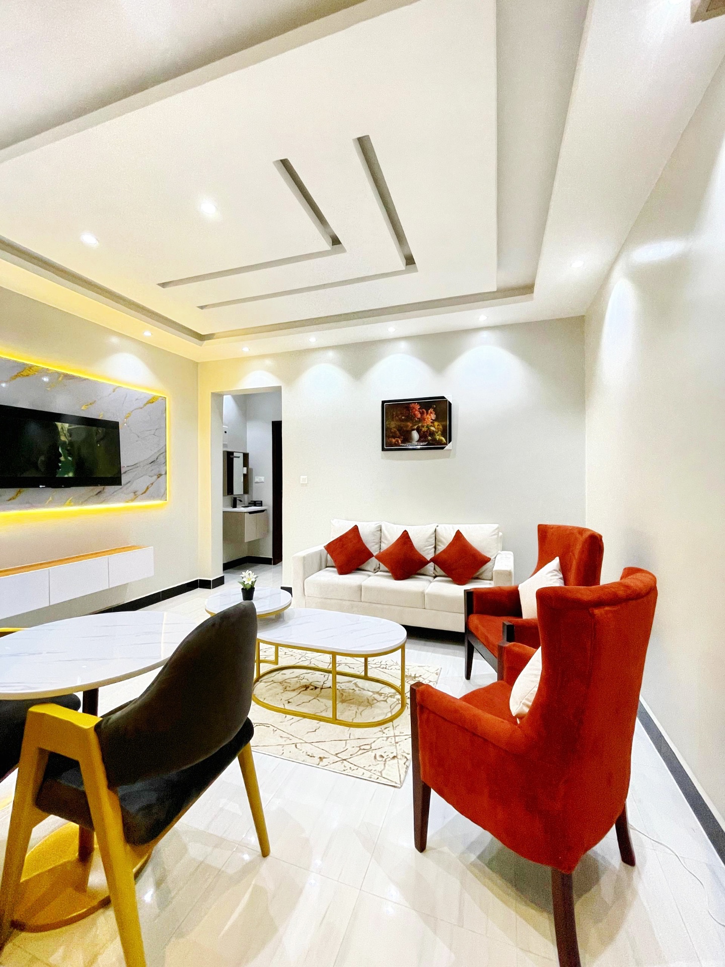 Modern furnished living room at SN Suites Apartments